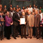 Bro Dosh Jackson, flanked by family, friends and Omega brothers, is recognized in the Atlanta City Council chambers by Council President Bro. Ceasar Mitchell