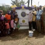 The brothers of Tau Chi Chapter representing Eta Omega Chapter at the Akwamufie Community Borehole dedication. Joining them is Elected Assemblyman Nana Kojo and the residents of Akwamufie.