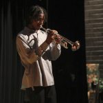 George Bostic shows his trumpet skills